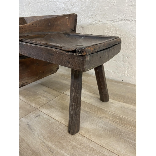 9 - A 19th century primitive pine and leather cobbler's bench - approx. 46cm high x 96cm wide x 50cm dee... 