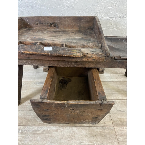 9 - A 19th century primitive pine and leather cobbler's bench - approx. 46cm high x 96cm wide x 50cm dee... 