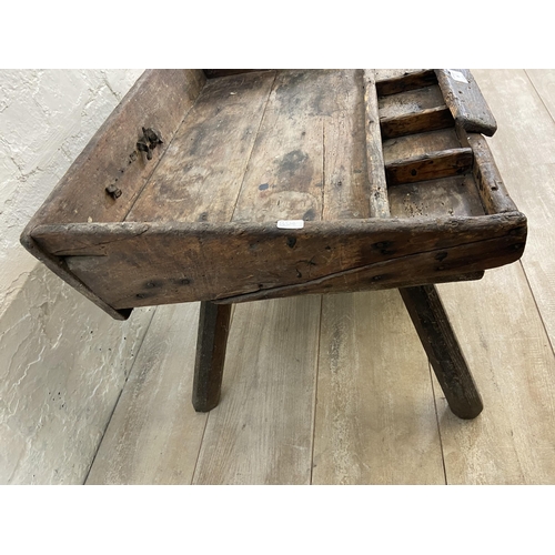 9 - A 19th century primitive pine and leather cobbler's bench - approx. 46cm high x 96cm wide x 50cm dee... 