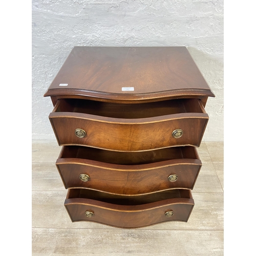 94 - A Bevan Funnell Ltd Reprodux mahogany serpentine chest of drawers - approx. 66cm high x 53cm wide x ... 