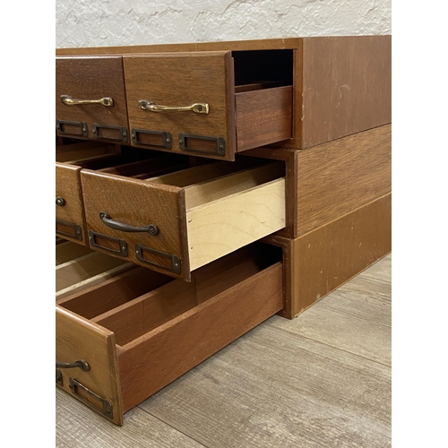 99 - Three sets of mid 20th century mahogany and plywood six drawer index filing cabinets - each approx. ... 