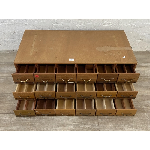 99 - Three sets of mid 20th century mahogany and plywood six drawer index filing cabinets - each approx. ... 