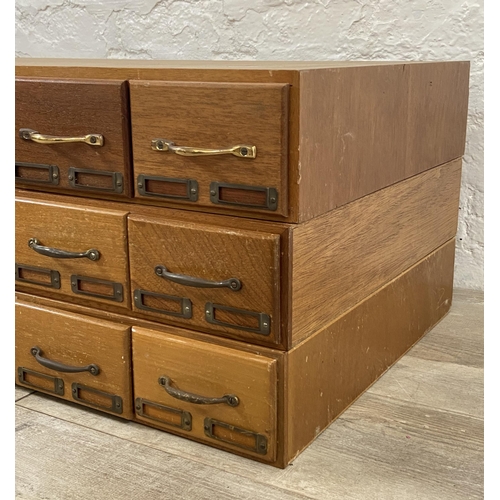 99 - Three sets of mid 20th century mahogany and plywood six drawer index filing cabinets - each approx. ... 