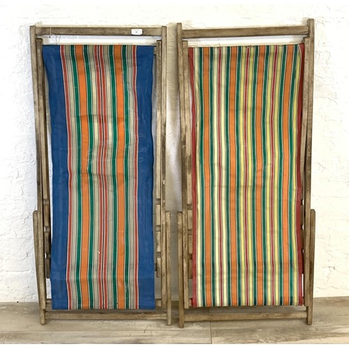 49 - Two mid 20th century beech framed sun loungers