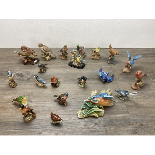 A collection of bird figurines to include Beswick, Bossons, Country ...