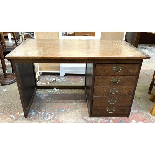 95 - A mid 20th century bespoke oak office desk with five fall front drawers - approx. 62cm high x 107cm ... 