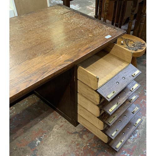 95 - A mid 20th century bespoke oak office desk with five fall front drawers - approx. 62cm high x 107cm ... 