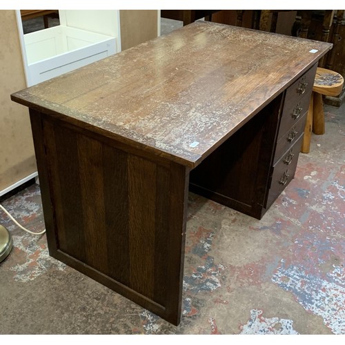 95 - A mid 20th century bespoke oak office desk with five fall front drawers - approx. 62cm high x 107cm ... 