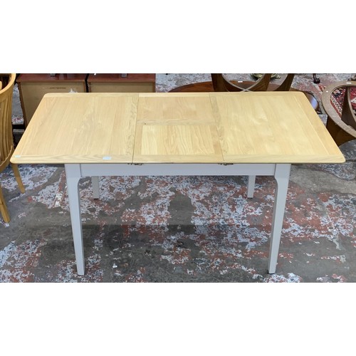 97 - An Arighi Bianchi oak and grey painted extending dining table - approx. 79cm high x 120cm long x 85c... 