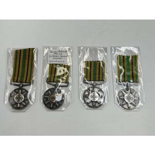 2338 - Four South African Police Long Service medals