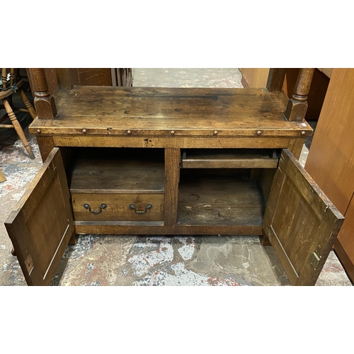 44 - A 19th century oak buffet with hand painted floral design back - approx. 126cm high x 110cm wide x 4... 