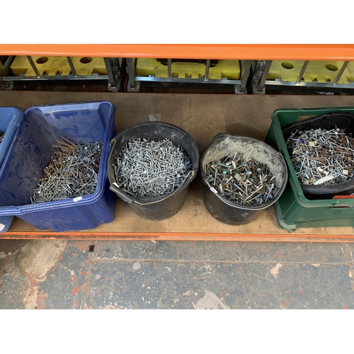 1039 - A large collection of various sized nails, tacks and screws