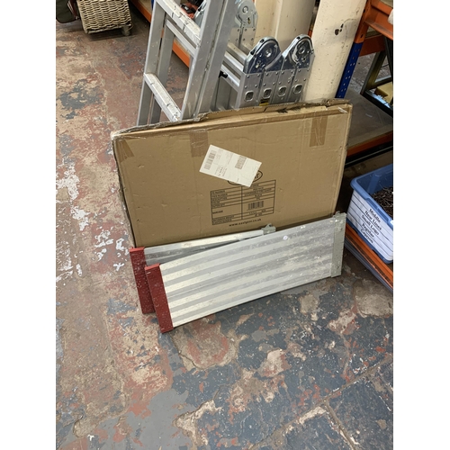 1040 - Two pairs of aluminium ladders, one step and one work platform together with a boxed fire guard