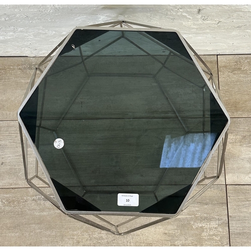 10 - A contemporary black glass and metal hexagonal side table - approx. 51cm high x 41 cm wide x 35cm de... 