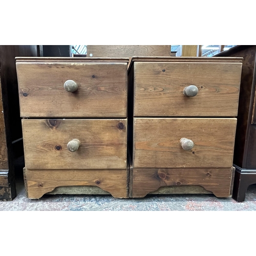 102 - A pair of modern solid pine bedside chests of drawers - approx. 63cm high x 45cm wide x 47cm deep