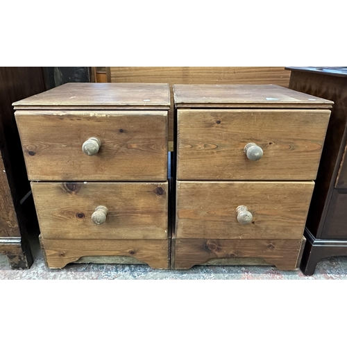 102 - A pair of modern solid pine bedside chests of drawers - approx. 63cm high x 45cm wide x 47cm deep