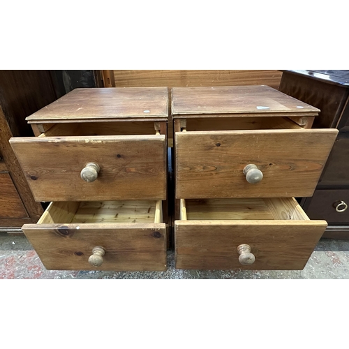 102 - A pair of modern solid pine bedside chests of drawers - approx. 63cm high x 45cm wide x 47cm deep