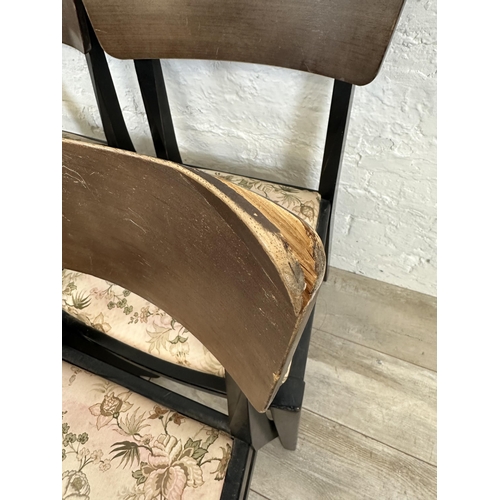 110 - Four mid 20th century teak and ebonised dining chairs with floral fabric upholstery