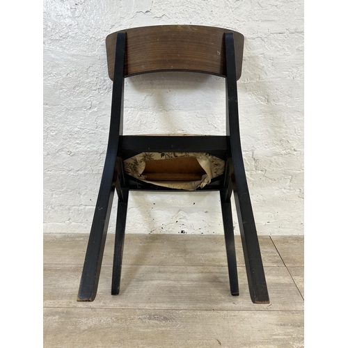 110 - Four mid 20th century teak and ebonised dining chairs with floral fabric upholstery