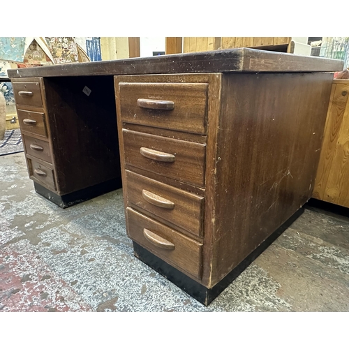 111 - A mid 20th century Partridge & Cooper (O.E.) Ltd mahogany pedestal desk - approx. 77cm high x 152cm ... 