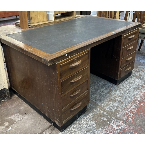 111 - A mid 20th century Partridge & Cooper (O.E.) Ltd mahogany pedestal desk - approx. 77cm high x 152cm ... 