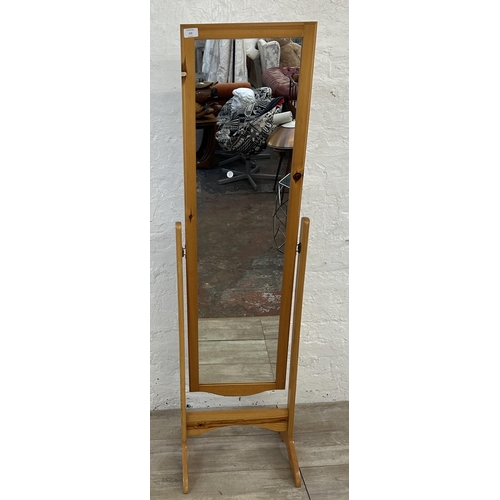 115 - A pine framed cheval mirror - approx. 154cm high