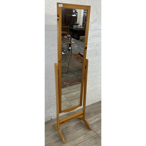 115 - A pine framed cheval mirror - approx. 154cm high