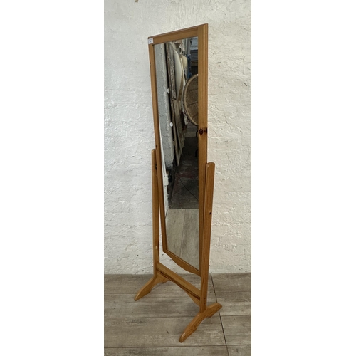 115 - A pine framed cheval mirror - approx. 154cm high