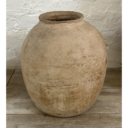 13 - Four ceramic items, three hand made clay floor standing vases - largest approx. 70cm high and one Hi... 