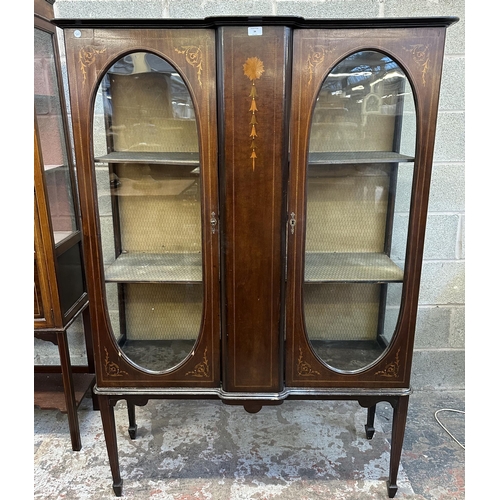 34 - An Edwardian inlaid mahogany display cabinet on tapering supports - approx. 165cm high x 113cm wide ... 