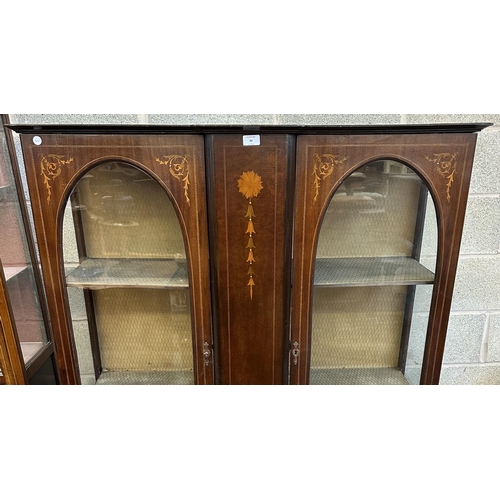 34 - An Edwardian inlaid mahogany display cabinet on tapering supports - approx. 165cm high x 113cm wide ... 