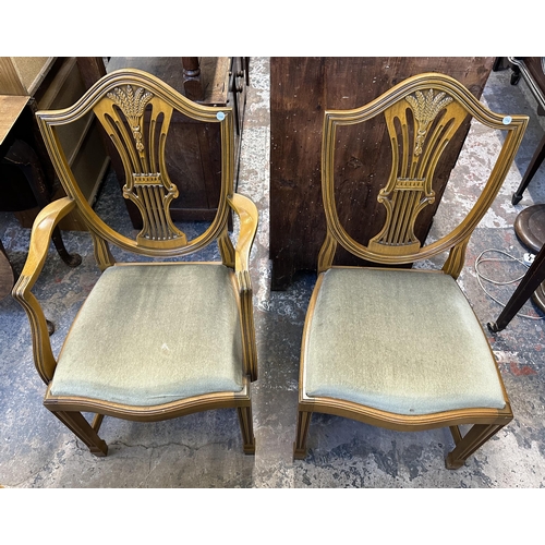 48 - A Georgian style yew wood twin pedestal extending dining table and six shield back chairs - approx. ... 