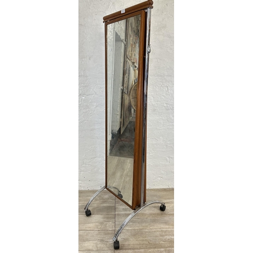 54 - A mid 20th century style teak and chrome plated double sided tailor's shop cheval mirror - approx. 1... 