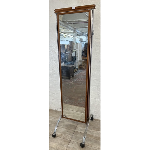 54 - A mid 20th century style teak and chrome plated double sided tailor's shop cheval mirror - approx. 1... 