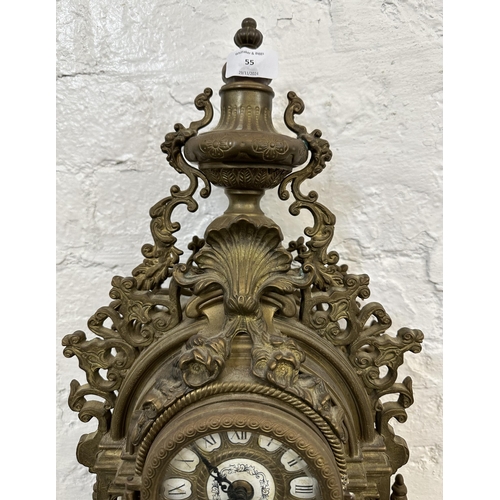 55 - A French Louis XV style brass mantel clock - approx. 60cm high