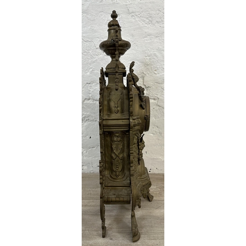 55 - A French Louis XV style brass mantel clock - approx. 60cm high