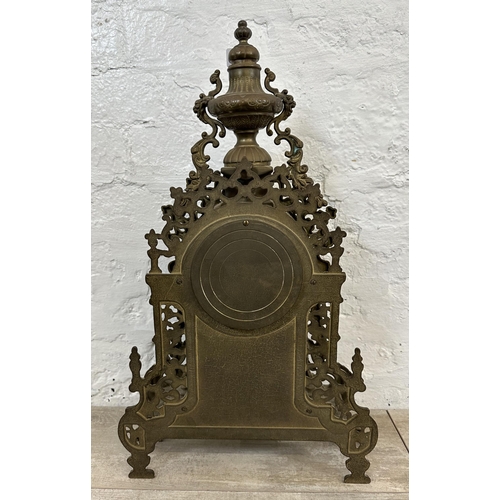 55 - A French Louis XV style brass mantel clock - approx. 60cm high