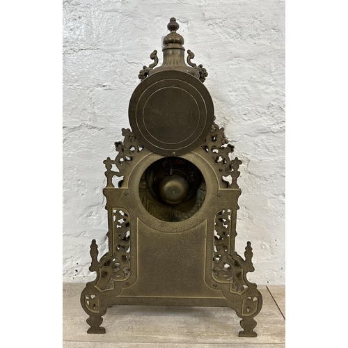 55 - A French Louis XV style brass mantel clock - approx. 60cm high