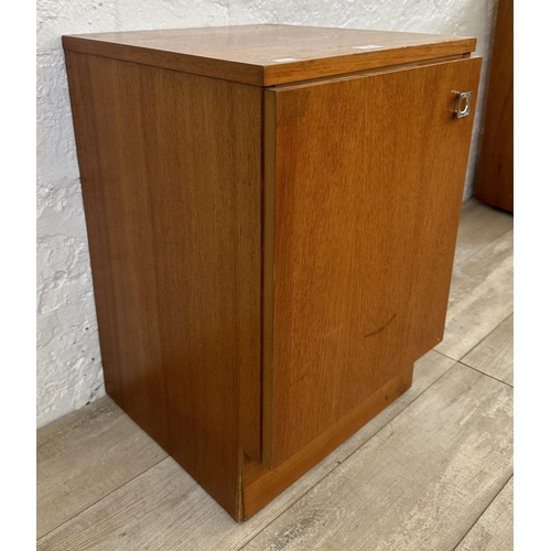 57 - Two mid 20th century teak bedside cabinets - largest approx. 69cm high x 40cm wide x 36cm deep