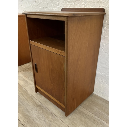 57 - Two mid 20th century teak bedside cabinets - largest approx. 69cm high x 40cm wide x 36cm deep