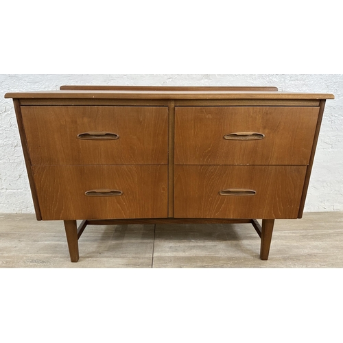 58 - A mid 20th century teak concave chest of drawers - approx. 72cm high x 108cm wide x 44cm deep