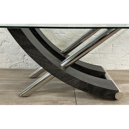 6 - A contemporary bevelled glass coffee table on chrome plated and black wood effect base - approx. 45c... 