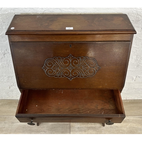 61 - A mid 20th century carved oak student's bureau bookcase - approx. 101cm high x 69cm wide x 32cm deep