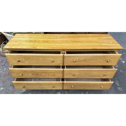 68D - A contemporary oak chest of drawers - approx. 81cm high x 158cm wide x 47cm deep