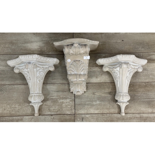 7 - Five items of wall décor, three Nostalgia England hand cast and decorated wall brackets - largest ap... 