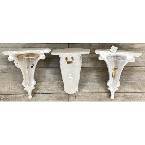 7 - Five items of wall décor, three Nostalgia England hand cast and decorated wall brackets - largest ap... 