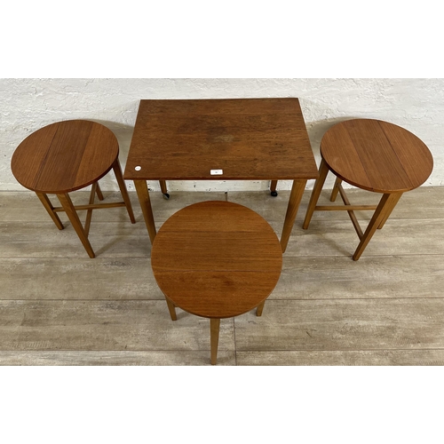 70 - A mid 20th century Poul Hundevad teak nest of four tables - approx. 56cm high x 62cm wide x 42cm dee... 