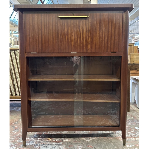 74 - A mid 20th century teak cocktail cabinet - approx. 135cm high x 110cm wide x 40.5cm deep