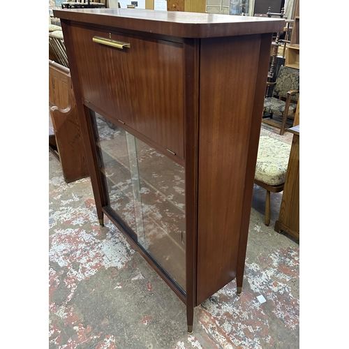 74 - A mid 20th century teak cocktail cabinet - approx. 135cm high x 110cm wide x 40.5cm deep