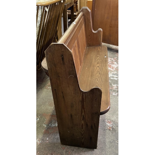 75 - A Victorian pitch pine church pew - approx. 92cm high x 145cm wide x 45cm deep